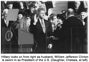 Hillary Rodham Clinton watches husband, Bill being sworn in as president