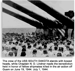 Chaplain leading prayer on ship