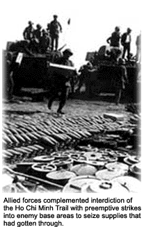 Allied troops seize supplies from enemy base area