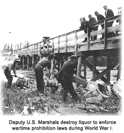 US Marshals destroying liquor