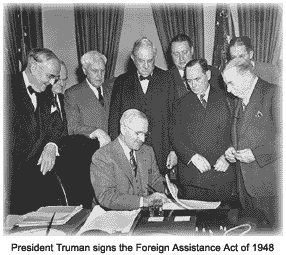Truman signs Foreign Assistance Act